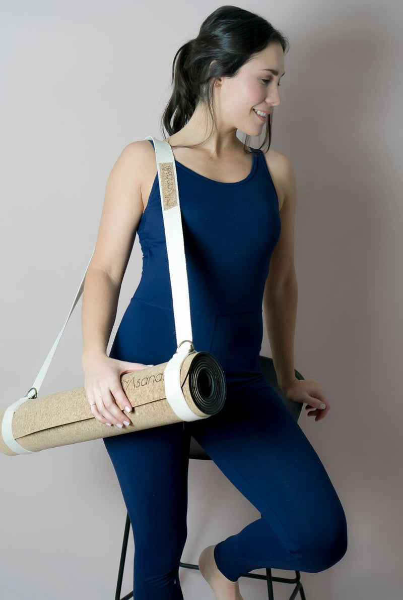 how to use carrying strap for yoga best cork yoga mat review why buy a cork yoga mat, benefits of yogamat cork, thick cork mat, the asanas, cork yoga block, yoga wheel, carrying strap for yoga mat